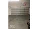 Spacious garage with an automatic door offers ample parking and storage space at 8249 Retreat Ln, Indianapolis, IN 46259