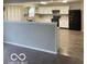 The kitchen features white cabinets, modern appliances, and a decorative backsplash at 8249 Retreat Ln, Indianapolis, IN 46259