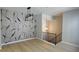 Dining Room features modern lighting and staircase to second floor at 8315 Woodall Dr, Indianapolis, IN 46268