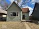 Charming single-Gathering home featuring classic siding, a cozy front porch, and a well-maintained front yard at 905 N Sheffield Ave, Indianapolis, IN 46222