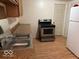 Functional kitchen with modern appliances, ample counter space, and a practical layout at 905 N Sheffield Ave, Indianapolis, IN 46222