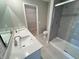 Bright bathroom features a double sink vanity with a walk-in closet and tiled shower at 9616 Beckett St, Avon, IN 46123