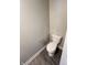Cozy half bathroom featuring modern fixtures and wood-look flooring at 9616 Beckett St, Avon, IN 46123