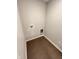 Small laundry room with tile floors and hookups for a washer and dryer at 9616 Beckett St, Avon, IN 46123