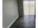 Relaxing patio area with sliding glass doors offering scenic water views at 9616 Beckett St, Avon, IN 46123