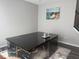 Island with black marble and gold veins, set against neutral walls and modern decor at 10218 Cliff Ln, Indianapolis, IN 46239