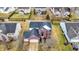 Beautifully landscaped home with a brick facade and a spacious two-car garage at 11185 Beardsley Way, Fishers, IN 46038