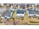 Aerial shot of a backyard featuring a patio with outdoor furniture and well-kept lawn at 11185 Beardsley Way, Fishers, IN 46038