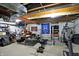 Basement gym features workout machines, weight training equipment, and storage at 11185 Beardsley Way, Fishers, IN 46038