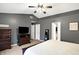 Relaxing main bedroom features a large bed, dresser, TV, and ample storage space at 11185 Beardsley Way, Fishers, IN 46038