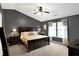 Spacious main bedroom with vaulted ceiling, a ceiling fan, and a comfortable bed at 11185 Beardsley Way, Fishers, IN 46038