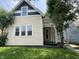 Charming home featuring a quaint front porch and well-maintained yard, creating a welcoming curb appeal at 1153 Villa Ave, Indianapolis, IN 46203