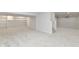 Spacious finished basement with carpet, recessed lighting, and built-in shelving offers versatile living space at 11708 Rolling Springs Dr, Carmel, IN 46033