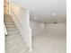Finished basement with neutral carpet, recessed lighting, and stairs to upper level offers versatile living space at 11708 Rolling Springs Dr, Carmel, IN 46033