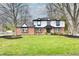 Charming two-story home with a well-maintained lawn and inviting curb appeal at 11708 Rolling Springs Dr, Carmel, IN 46033