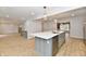 Beautiful open-concept kitchen with stainless appliances, and large center island at 11708 Rolling Springs Dr, Carmel, IN 46033
