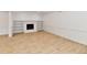 Unfurnished living room with fireplace, built-in shelving, and sliding glass doors to the exterior at 11708 Rolling Springs Dr, Carmel, IN 46033