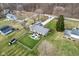Expansive aerial view of a home featuring a patio and manicured lawn at 1194 S 300 E, Anderson, IN 46017