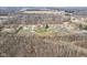A landscape of houses interspersed with patches of trees and roadways at 1194 S 300 E, Anderson, IN 46017