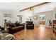 Comfortable living room with wood floors, vaulted ceilings, and leather furniture at 1194 S 300 E, Anderson, IN 46017