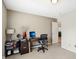 This office has a work desk, a rolling chair and neutral walls at 1194 S 300 E, Anderson, IN 46017