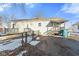 Backyard with gray siding, patio deck, and fenced in yard at 1196 S Vinewood Ave, Indianapolis, IN 46241
