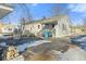 Backyard with gray siding, patio deck, and some snow on the ground at 1196 S Vinewood Ave, Indianapolis, IN 46241