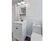 Bathroom featuring a vanity with black hardware and white shiplap walls at 1196 S Vinewood Ave, Indianapolis, IN 46241