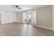Bright and open living room with gray flooring and a bay window at 1196 S Vinewood Ave, Indianapolis, IN 46241