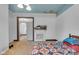 Bright bedroom with colorful quilt and decorative fireplace at 125 Kansas St, Indianapolis, IN 46225