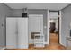Kitchen features white cabinets and a white shelving unit at 125 Kansas St, Indianapolis, IN 46225