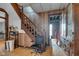 Entry way features wood paneling and a staircase that leads to the upper level at 125 Kansas St, Indianapolis, IN 46225