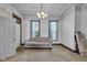 Bright living room with a neutral-toned sofa and large windows at 125 Kansas St, Indianapolis, IN 46225
