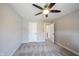 Neutral bedroom featuring a window, ceiling fan and carpeted floor at 12650 Misty Ridge Ct, Fishers, IN 46037