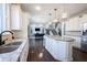 Spacious kitchen with island, pendant lighting, and open view to the living room at 12650 Misty Ridge Ct, Fishers, IN 46037