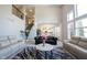 Spacious living room with fireplace, vaulted ceilings, and open to the kitchen at 12650 Misty Ridge Ct, Fishers, IN 46037