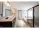 Elegant main bathroom featuring double sinks, a soaking tub, and a separate shower at 12650 Misty Ridge Ct, Fishers, IN 46037