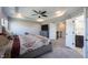 Serene main bedroom featuring tray ceilings and an ensuite bathroom at 12650 Misty Ridge Ct, Fishers, IN 46037