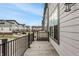 Balcony with wood deck and a view of neighboring townhomes at 13306 Saxony W Blvd, Fishers, IN 46037