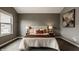Bedroom with a neutral color palette, plush carpeting, and decorative lamps at 13306 Saxony W Blvd, Fishers, IN 46037