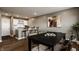 Eat-in kitchen area with counter seating, modern table, and white cabinets at 13306 Saxony W Blvd, Fishers, IN 46037