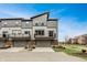 A modern townhome with two car garages, balconies, and contemporary design at 13306 Saxony W Blvd, Fishers, IN 46037