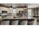 Bright kitchen featuring a large island with seating, stainless steel appliances, and ample counter space at 13306 Saxony W Blvd, Fishers, IN 46037
