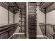 A highly organized walk-in closet complete with shelving, drawers, and rods at 13306 Saxony W Blvd, Fishers, IN 46037