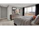 Bedroom featuring a large window and a dark-wood dresser with matching mirror at 15372 Hurst Rd, Fishers, IN 46040