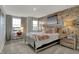 Charming bedroom with a decorative brick wall, cozy decor, and plenty of natural light at 15372 Hurst Rd, Fishers, IN 46040
