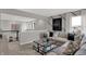 Cozy loft area with comfortable seating, stylish decor, and a view of the lower level living spaces at 15372 Hurst Rd, Fishers, IN 46040