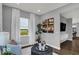 Comfortable living area featuring natural light and modern decor at 16917 Sandhurst Pl, Westfield, IN 46074