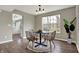Cozy dining area featuring a modern table set and view to kitchen at 17420 Dalton Ct, Noblesville, IN 46062
