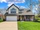 Charming two-story home with a well-maintained lawn, attached garage, and welcoming front porch at 17420 Dalton Ct, Noblesville, IN 46062